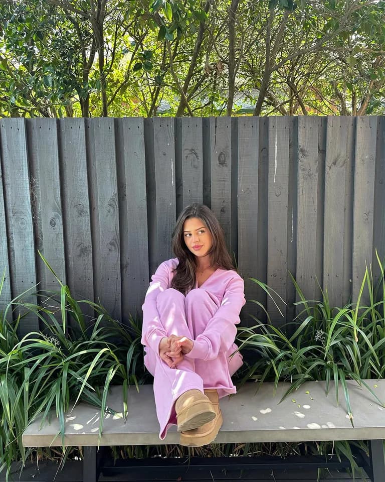Lifestyle · Pink Sweatsuit Bench, example 3 of 4